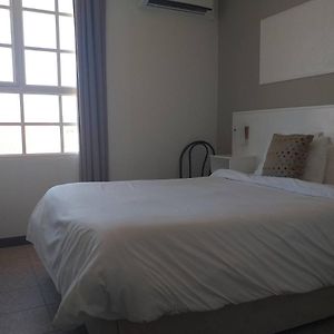 Kamer met een Queen Size Bed